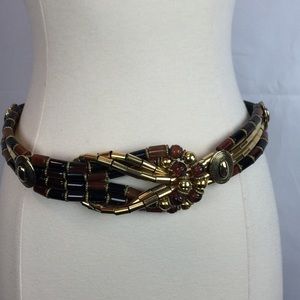 Tones of beaded brown/gold tone Knot belt